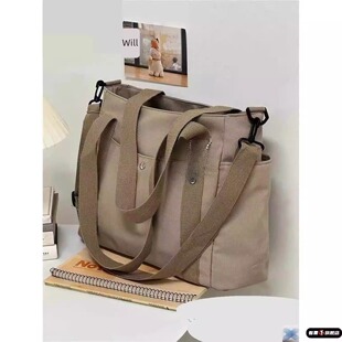 大容量结实单肩帆布包网红高级感帆布女2026款流行手提通勤托特包