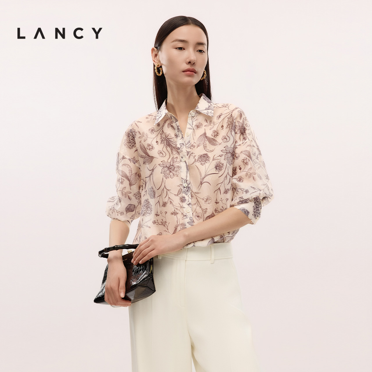 雅致印花 袖口排扣 弧度下摆