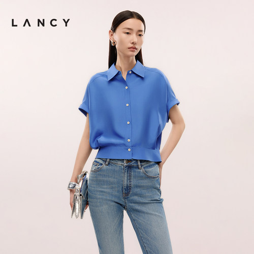 宽边下摆 撞色排扣 宽松双袖