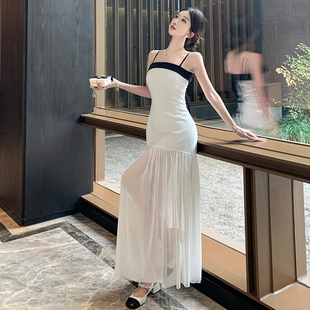 黑白拼色蝴蝶结网纱拼接抹胸连衣裙女夏海边度假一字肩吊带长裙子