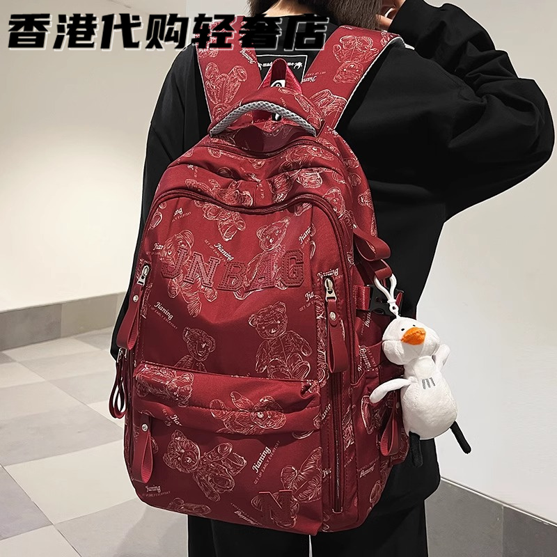 法国MKBM新款书包初中高中生减负护脊双肩包印花大容量电脑背包潮