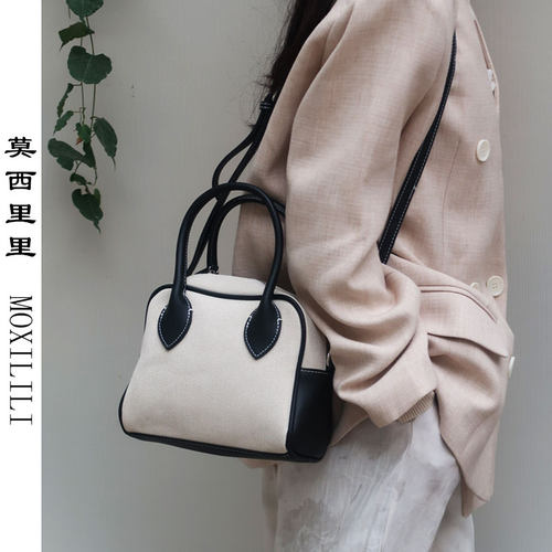 莫西里里新款撞色斜挎包