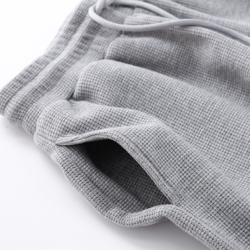 A PAIR OF SWEATPANTS TO WEAR  WAFFLE LIGHT GRAY LOOSE LEGGINGS MENS CASUAL DRAWSTRING SWEATPANTS WOMEN