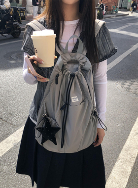 Unique blue抽绳双肩包女2025束口袋运动轻便双肩包旅行简约背包