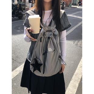 Unique blue抽绳双肩包女2025束口袋运动轻便双肩包旅行简约背包