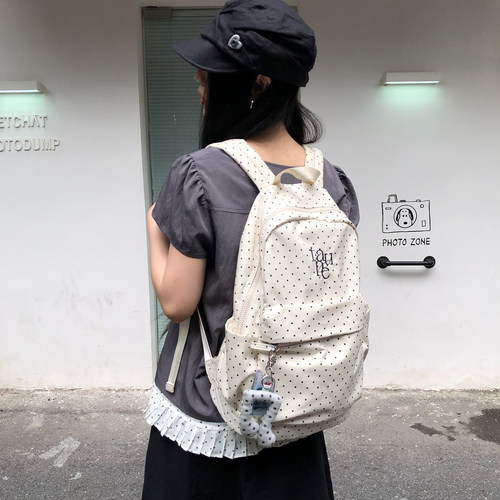 千禧风波点大容量收纳电脑双肩包