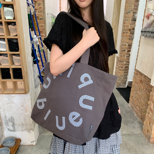 Unique blue 韩系字母格子大容量学生帆布包通勤单肩包女托特包