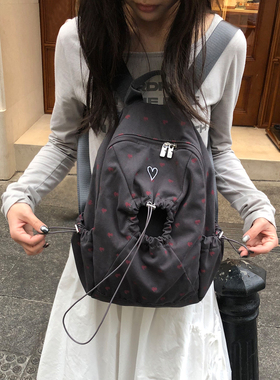 Unique blue 韩系爱心大容量轻便双肩包女学生书包旅行通勤背包