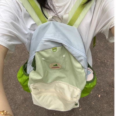 撞色双肩包女旅游轻便2024新款时尚设计感小众学生上课书包大容量