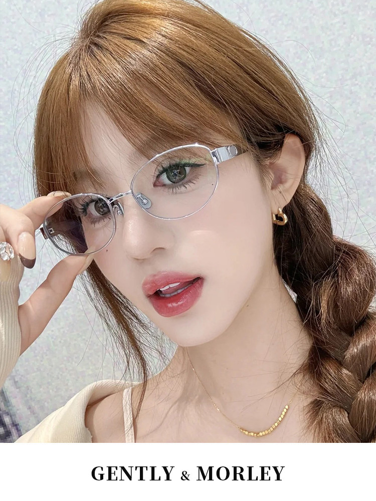 Woman wearing clear round eyeglasses with a branded text banner below