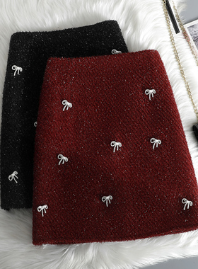 别针蝴蝶结半身裙季新年甜辣妹a字高腰新款红色亮丝包臀短裙0107k