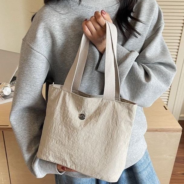 2025大容量秋冬新款防泼水面料ins慵懒尼龙布单肩托特通勤手提包,箱包皮具/热销女包/男包,托特包,淘宝优惠券,粉丝福利购,淘宝优惠卷