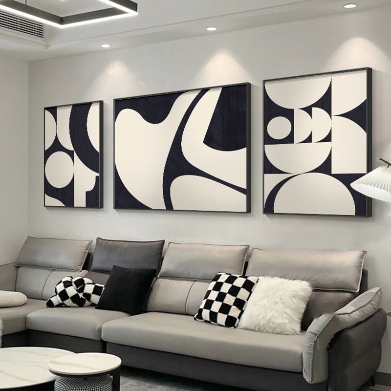黑白客厅三联画大气沙发