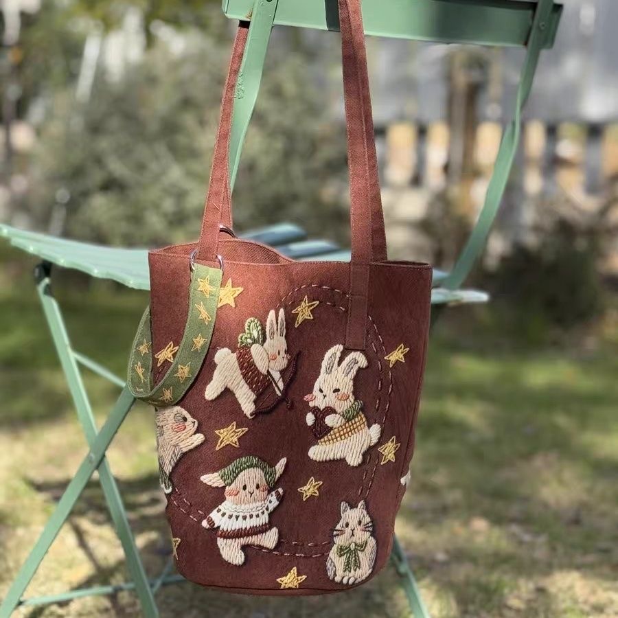 2026新款包包可爱兔个开心帆布包水桶包女斜挎单肩包女大容量