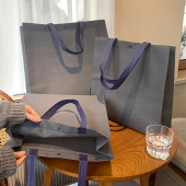 手拎袋子装 灰色服装 店无纺布手提袋定制定做LOGO购物包装 衣服环保