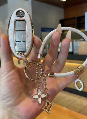 适用日产轩逸钥匙套逍客尼桑天籁奇骏骐达劲客蓝鸟劲高档壳扣包女