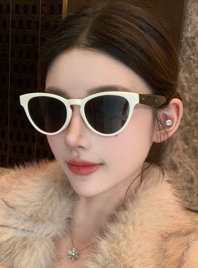 猫眼墨镜女新款奶白色冬季防紫外线雪地拍照显瘦防紫外线太阳眼镜