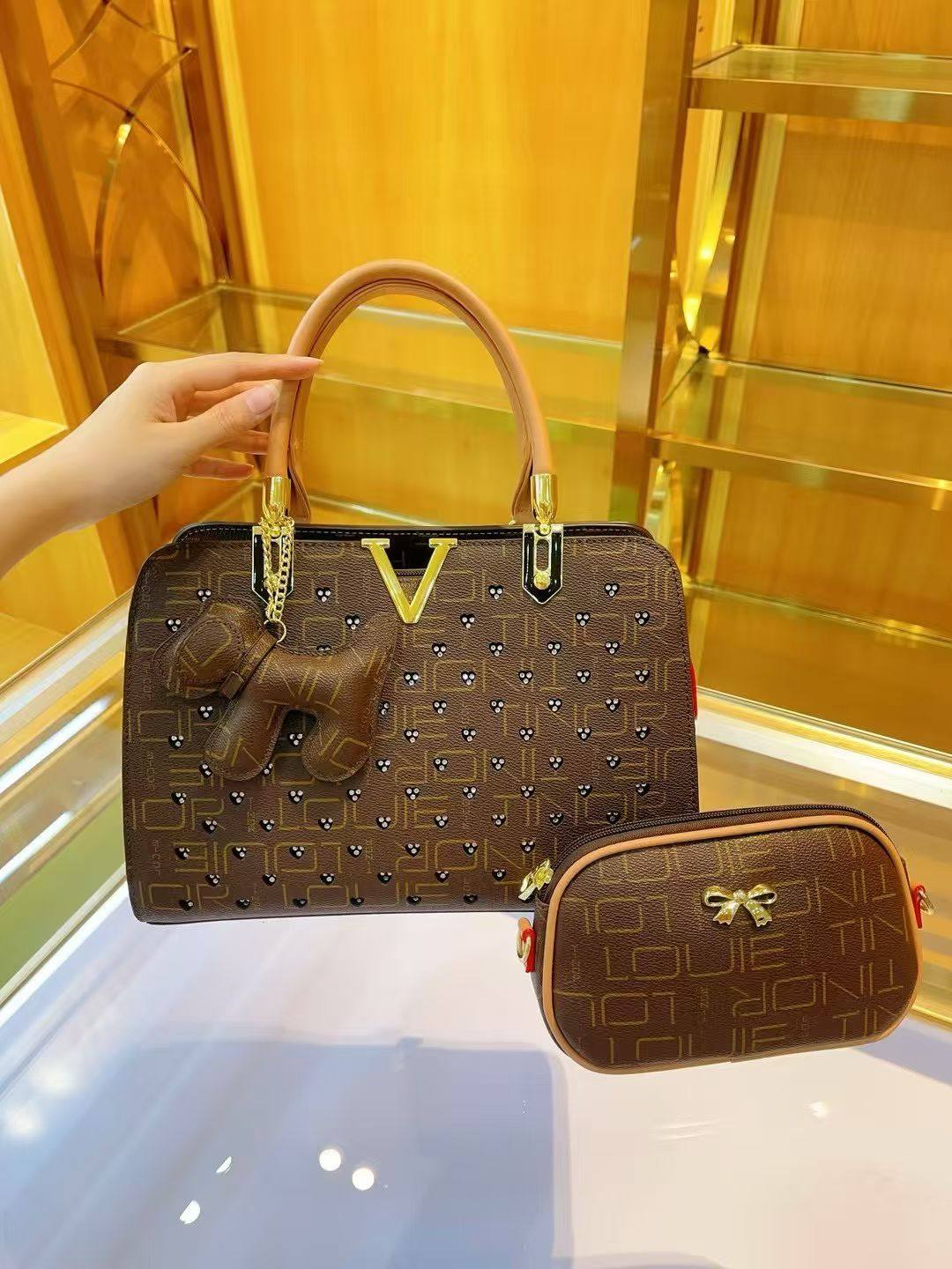 香港正品真皮女包2025新款时尚高级感老花波士顿枕头包手提斜挎包