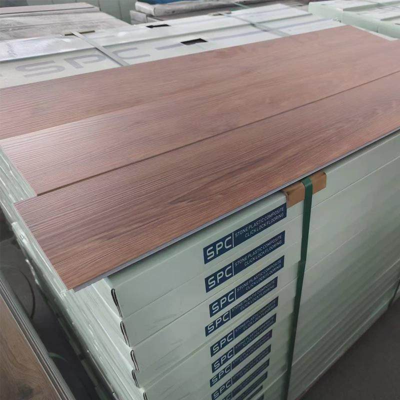 木纹装饰spc石塑地板防水自粘酒店旧房翻新型环保乙烯spc地板直销