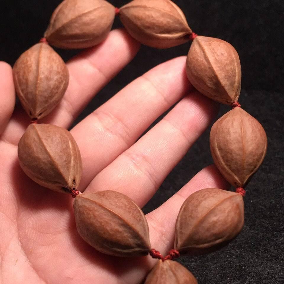 橄榄核手串 梅林铁头核橄榄核雕 铁核鲨鱼鹰嘴鲨鱼背原皮素核手串