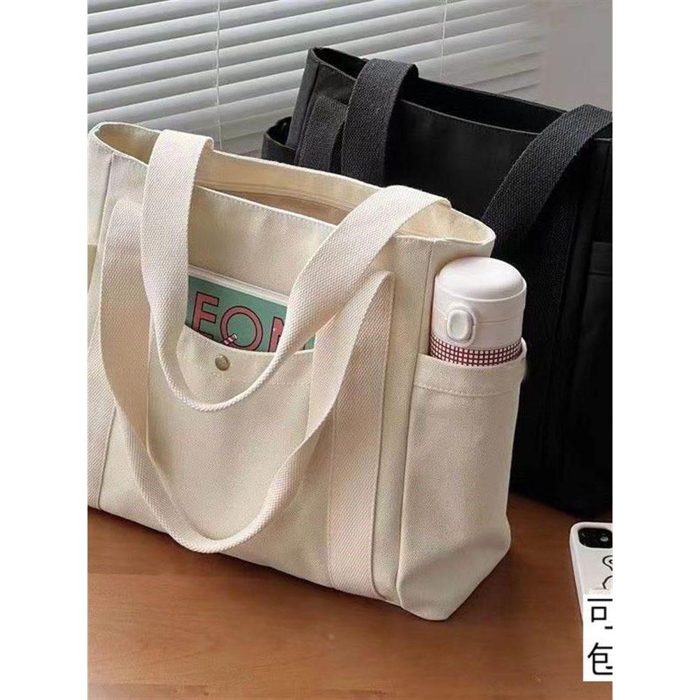 上班族出门通勤小拎包百搭手提杂物袋可爱2022女款轻便帆布便当包