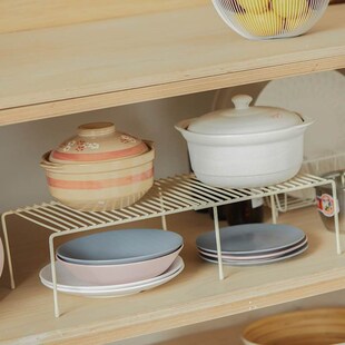 Scalable, wrought iron shelf under the kitchen sink cabinet