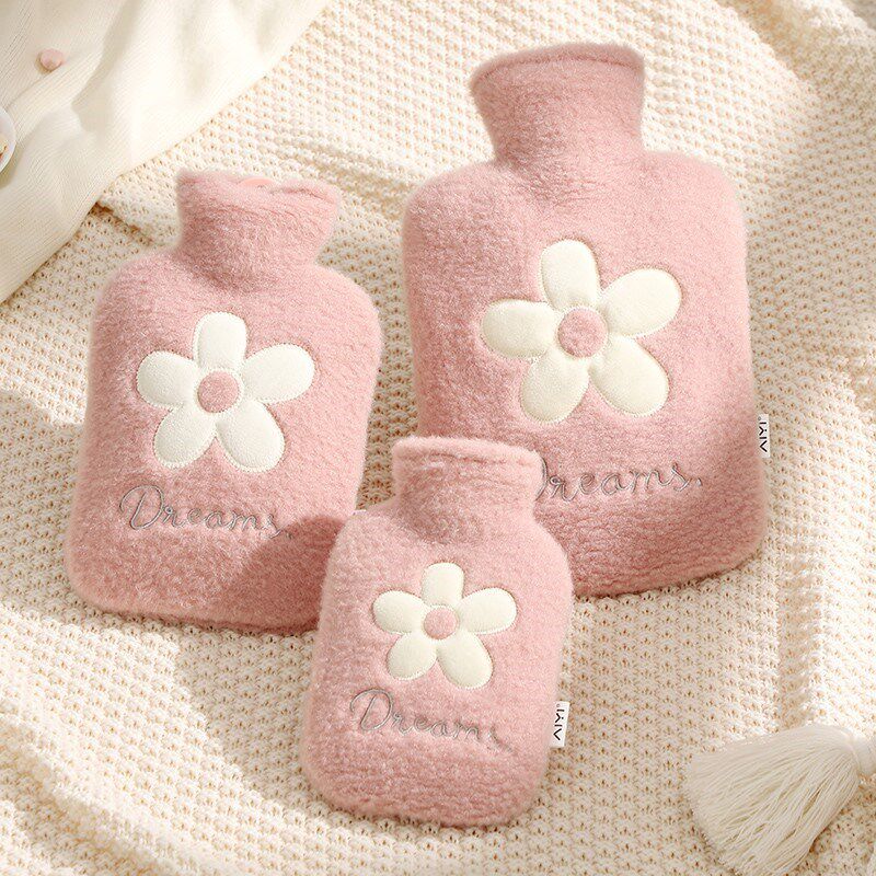Hot water bottle to warm your feet in bed in winter to warm