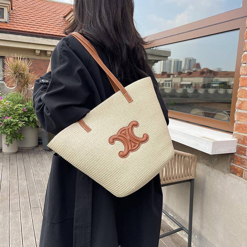 22时KAP5夏季新款编织0篮菜子包大容量单肩包休闲尚凯旋门草编托