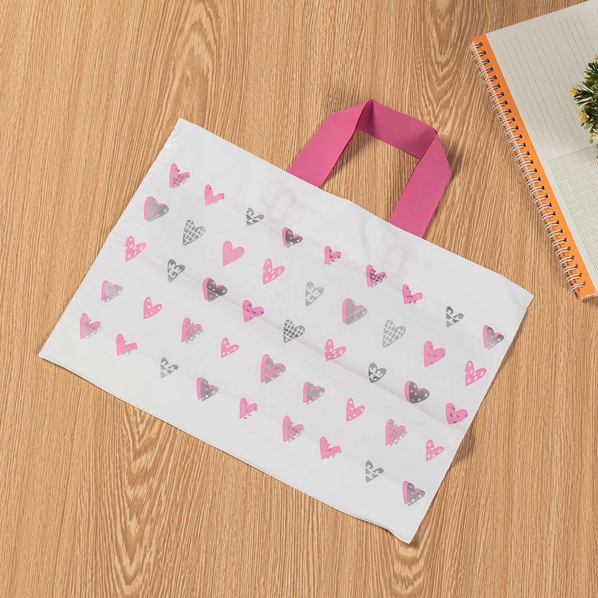 韩版爱心磨砂服装店塑料袋礼品袋手提打包袋子横版包装购物袋定。