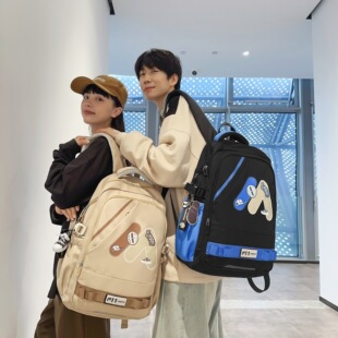 意尔康官网新款轻防水书包简约学生初中耐磨大学生减负护脊双肩包