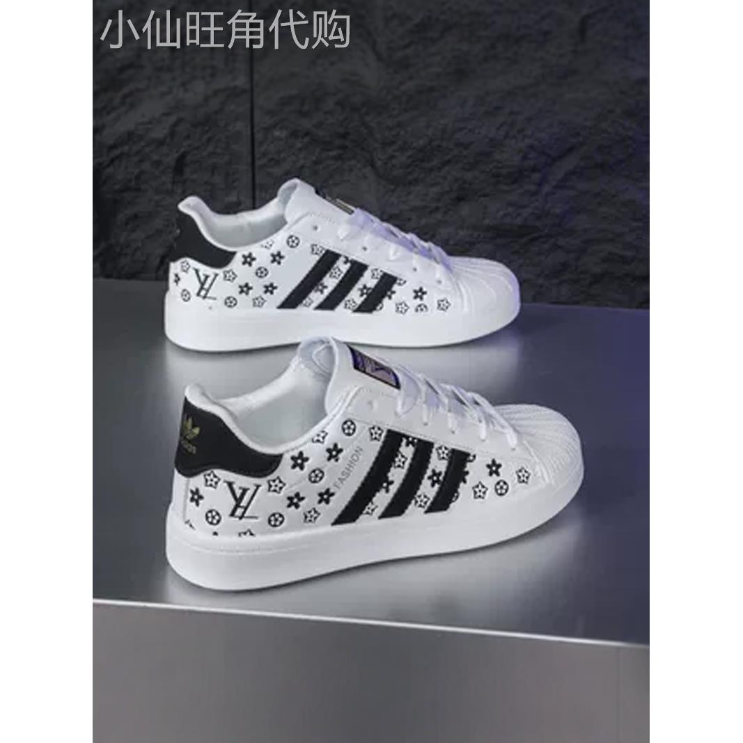 男鞋秋季2025新款真皮板鞋情侣款小白鞋百搭透气三道杠运动休闲鞋