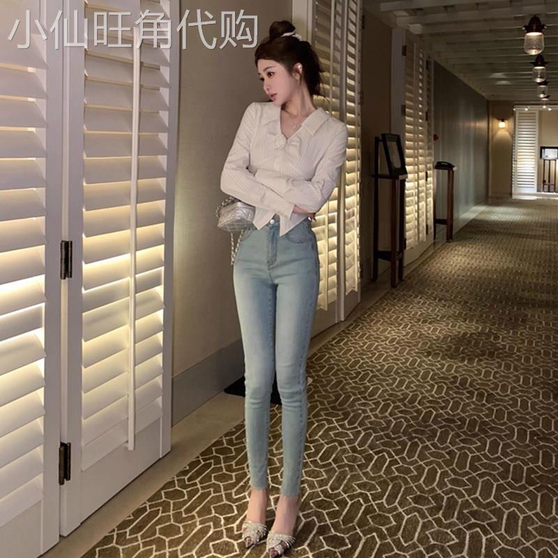 浅色辣妹提臀高腰牛仔裤女2026年春夏季弹力紧身百搭毛边小脚裤子