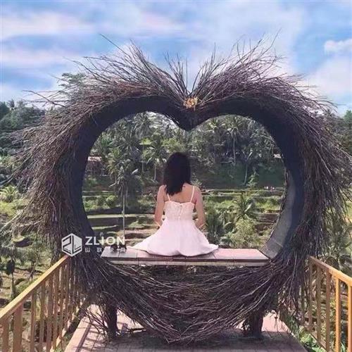 巴厘岛户外藤编网红创意爱心鸟巢秋千景区打卡婚纱拍摄道具圆形床