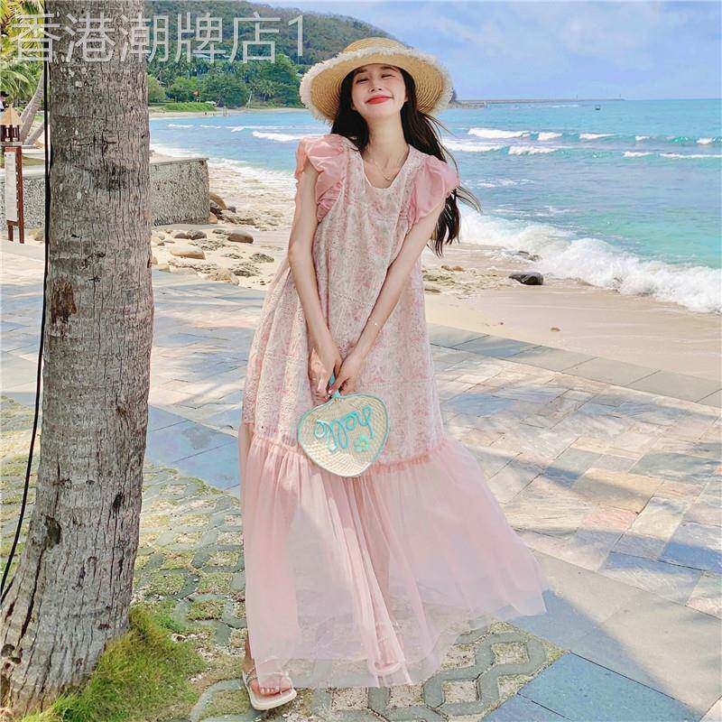 肌理感粉色连衣裙2025新款女夏海边度假显瘦拼接网纱设计感印花裙