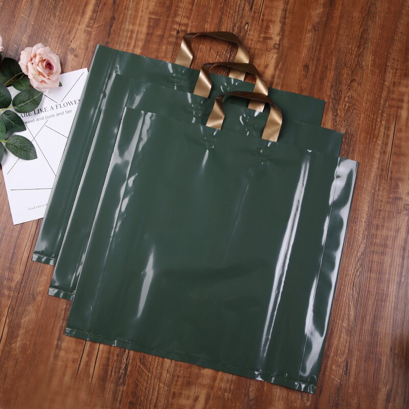 现货订做加厚服装店袋子手提袋塑料袋定制做logo大中小号礼品袋手