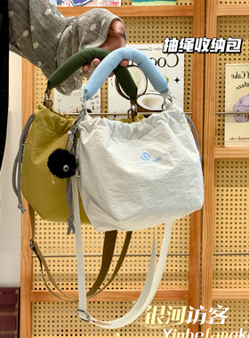 新款复古休闲手提水桶包小众设计抽绳收纳斜挎包百搭通勤旅行包包