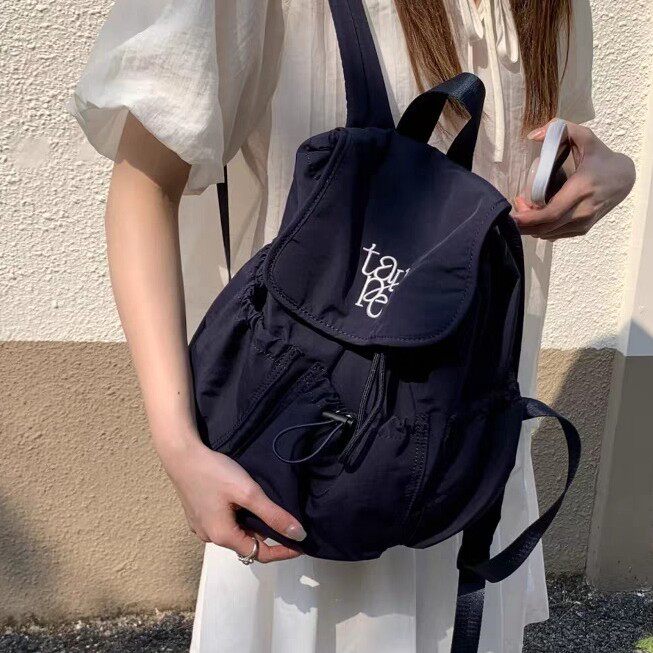 女士韩版抽绳大容量帆布双肩包