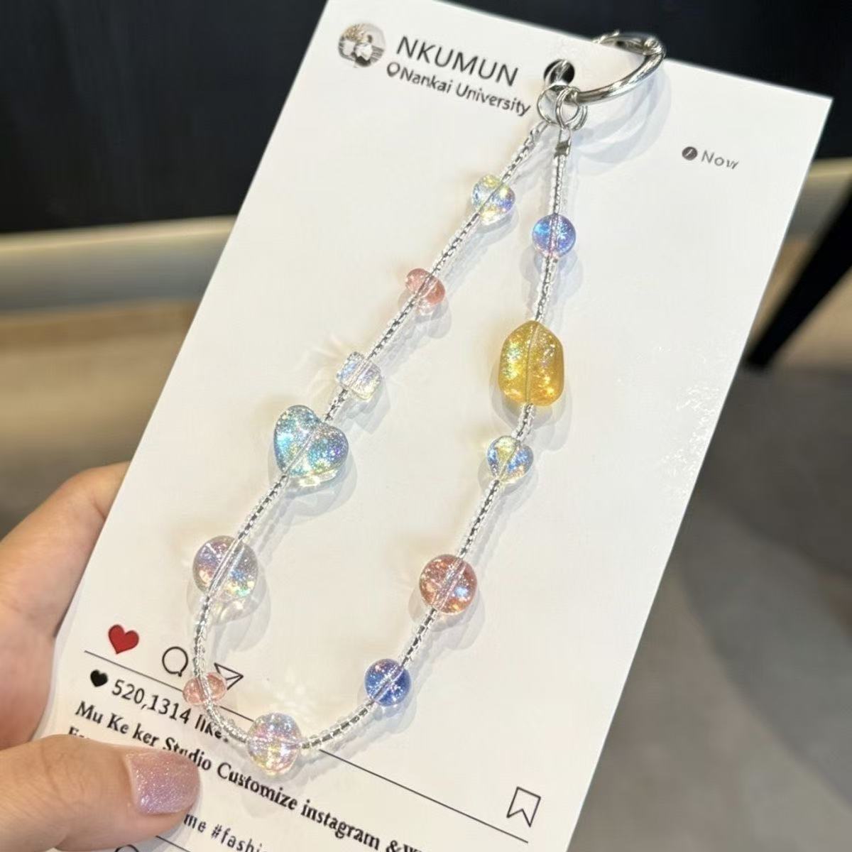 金洋壳高透水晶手机链新品促销