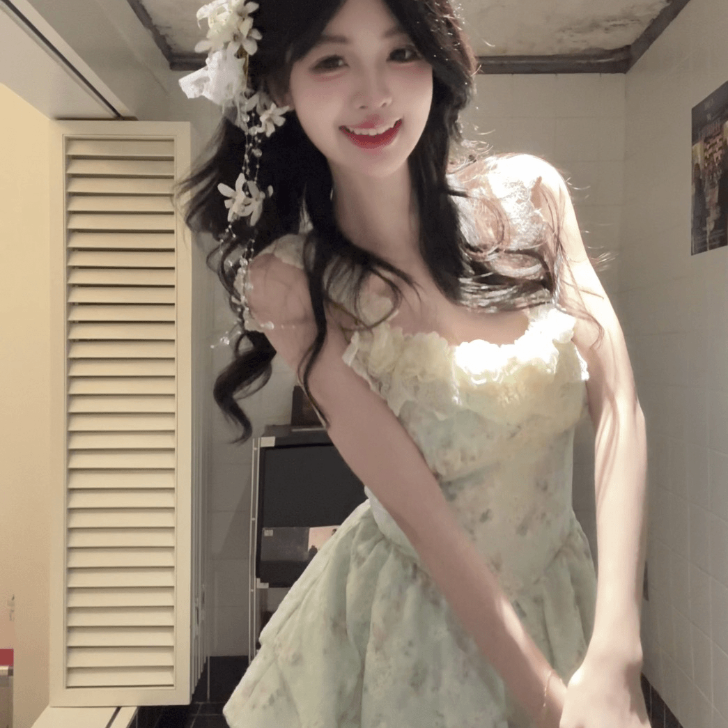 法式气质度假风绿色连衣裙女2025夏季新款不规则拼接设计感长裙子