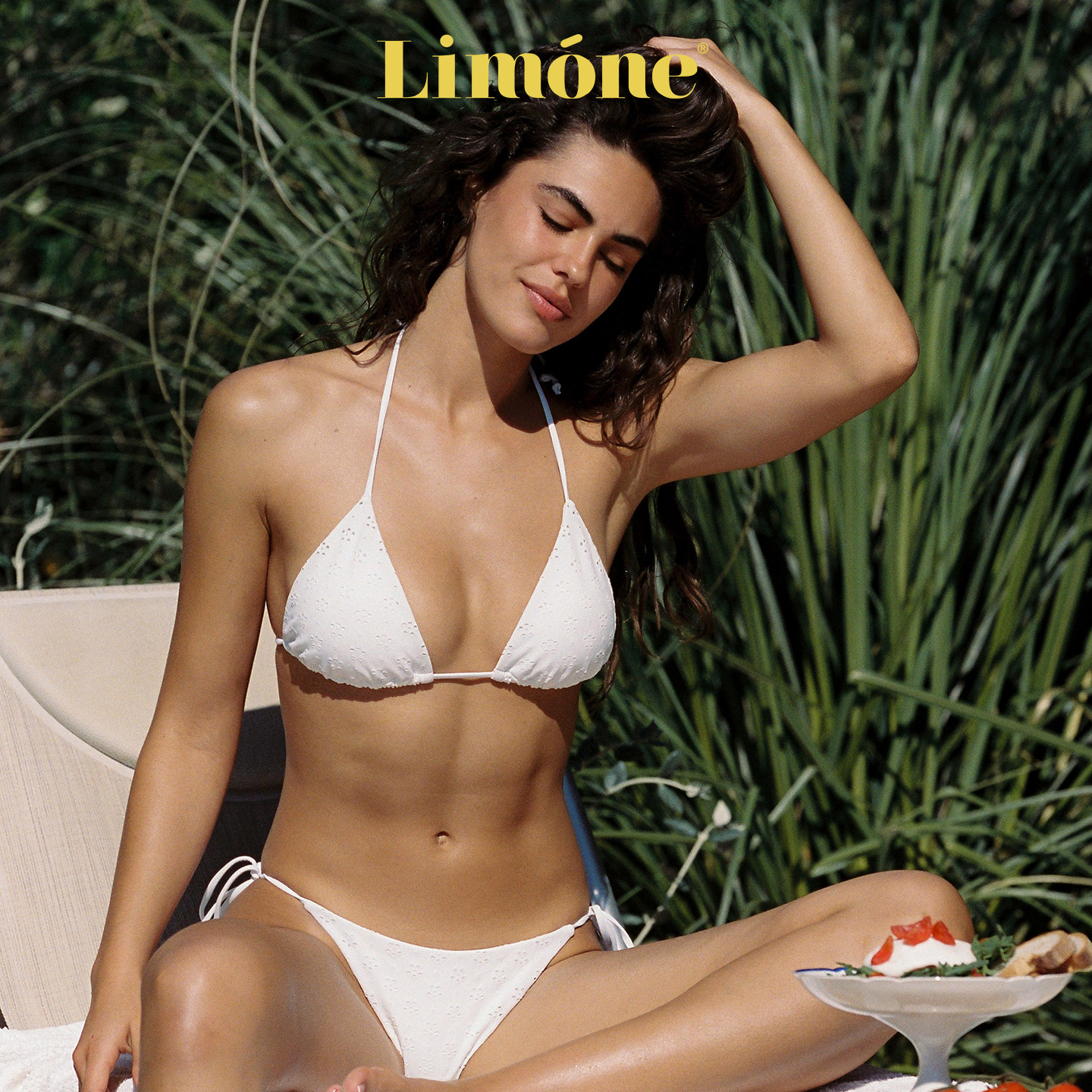Limone镂空花三角杯低腰比基尼女图片