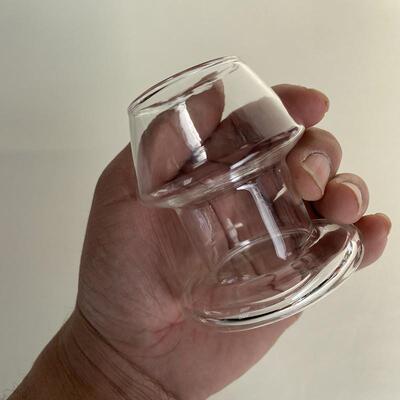 A self-pleasuring toy made of glass for use inside the anus.