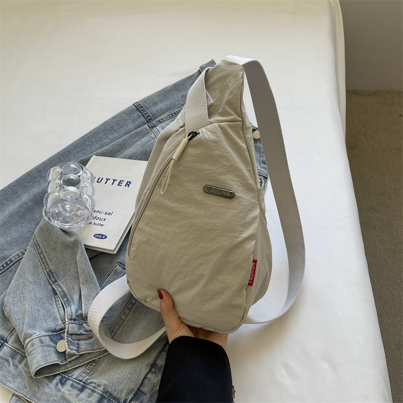 帆布斜挎包女2024新款时尚单肩包潮胸包男生休闲运动腰包小背包