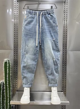 新款潮流水洗牛仔裤男士浅蓝色复古休闲九分裤破洞松紧抽绳裤子男
