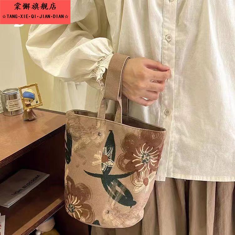 中国风覆古水桶帆布包2025新款可携式上班外出手提小拎包女买 菜