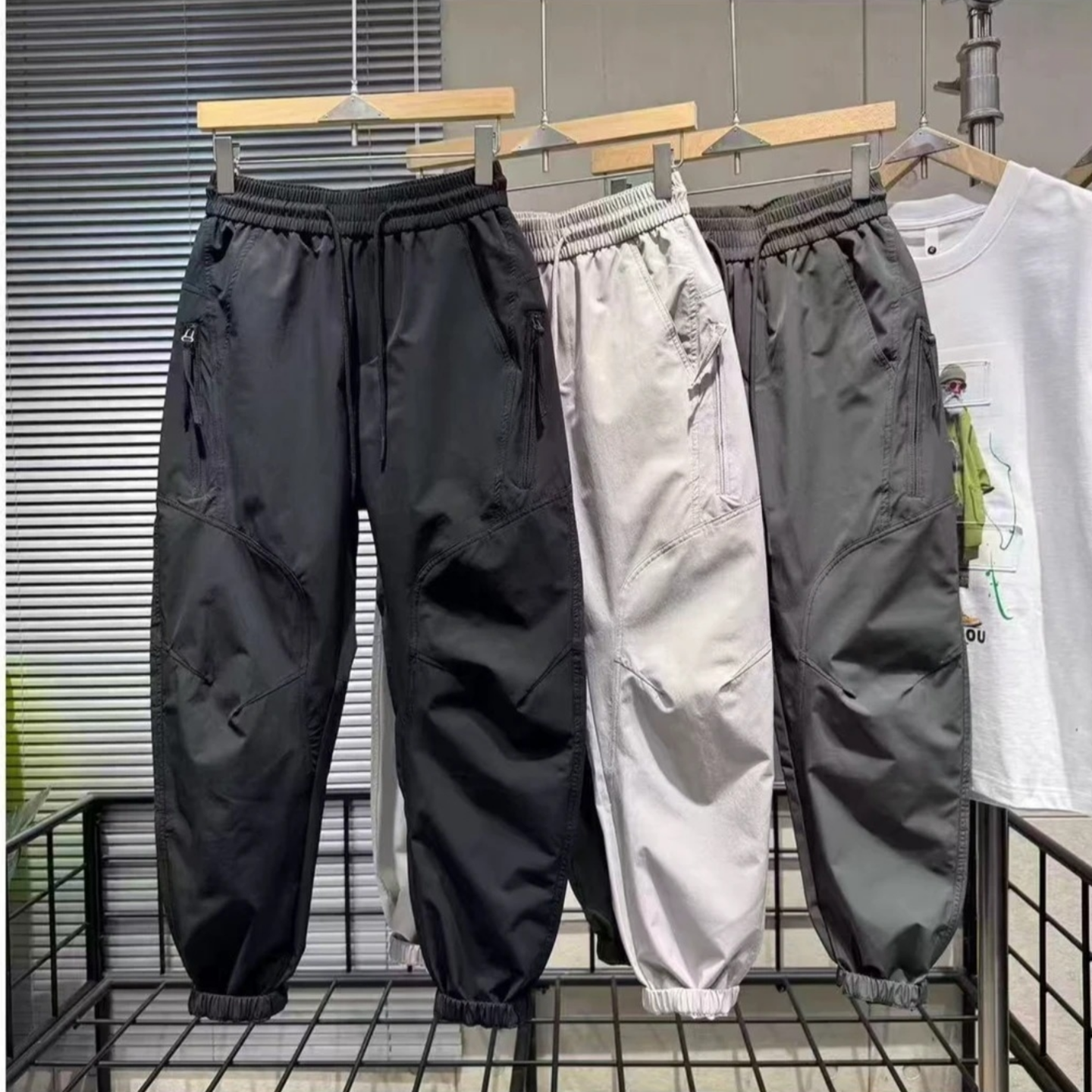 春季新款时尚百搭舒适透气拉链大口袋工装风运动裤潮流男士束脚裤