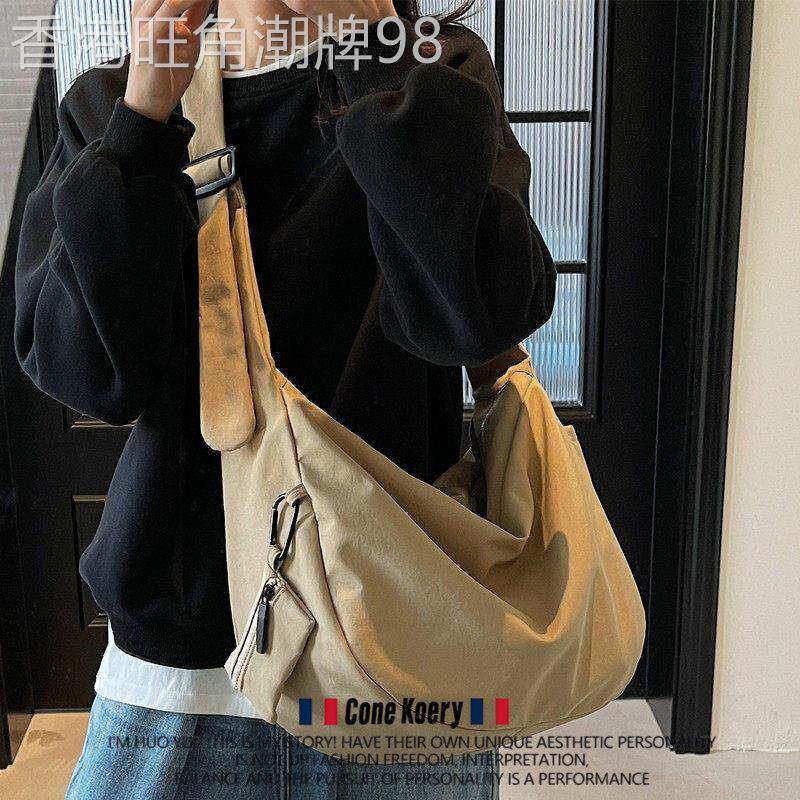 法国休闲百搭韩版帆布包斜挎包女学生党上课通勤大容量水饺包男
