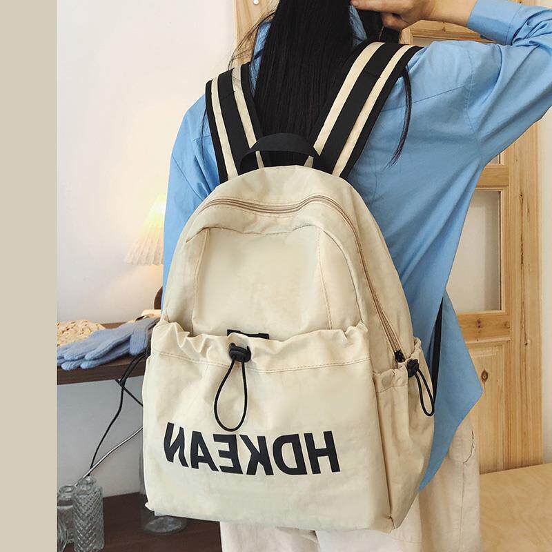 户外轻便双肩包简约休闲旅行百搭背包运动大容量女款韩系书包学生