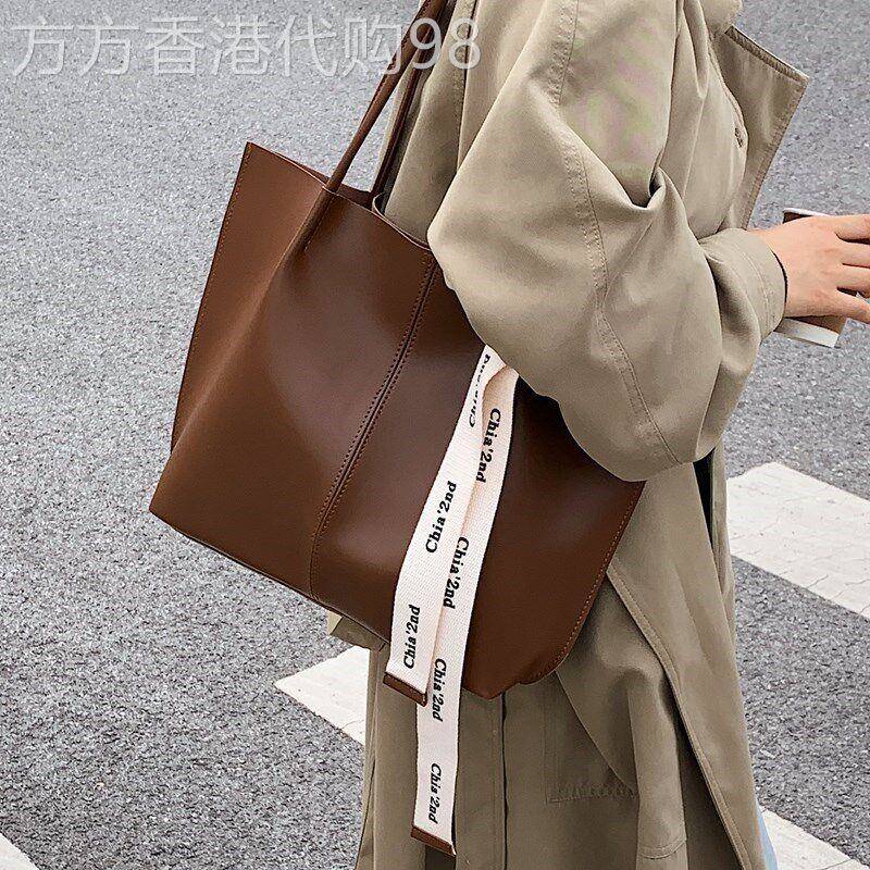 轻奢品牌女包高级感真皮大容量森系韩版通勤单肩包百搭小众托特包
