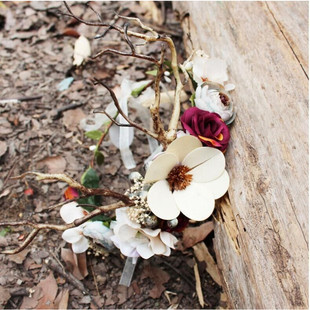 Forest tree branches, deer antlers, roses, dried flower gar