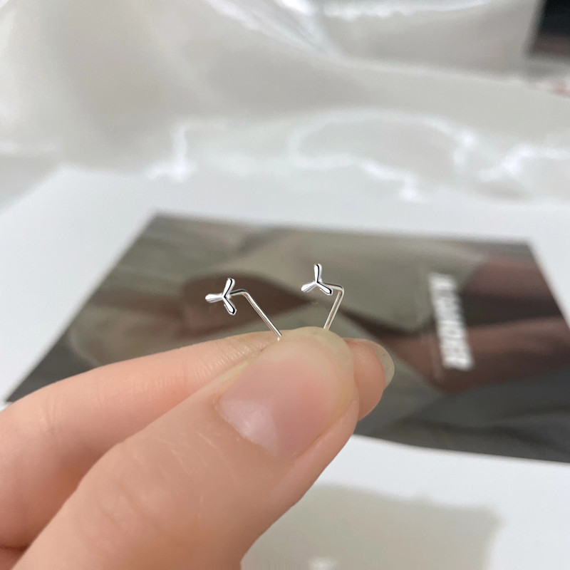 一念 999纯银耳钉旋转风车防堵女银针防掉耳骨钉小7字耳棒养
